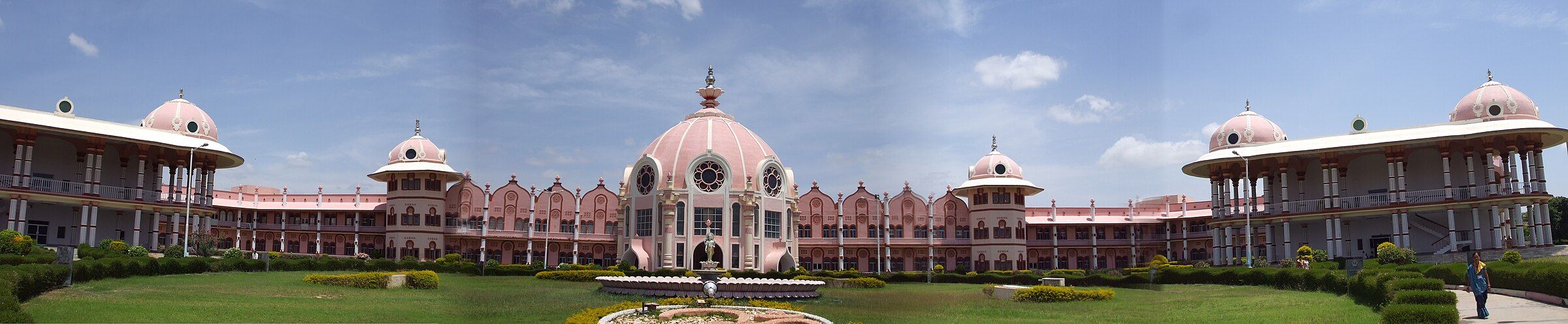 The full sweep of the Super Speciality Hospital — domes and wings across the valley